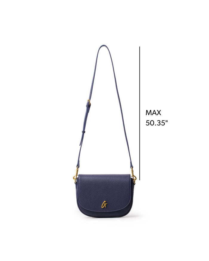 Navy medium pebble shoulder bag with adjustable strap and gold logo detail, perfect for stylish everyday use.