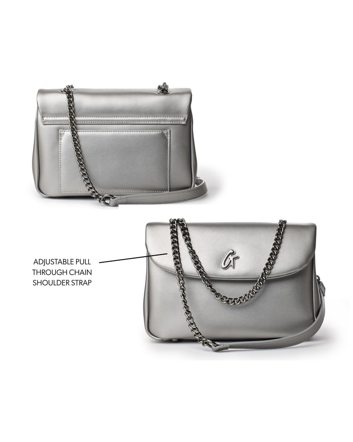 Medium standard flap bag in platinum with adjustable pull-through chain shoulder strap and sleek design.