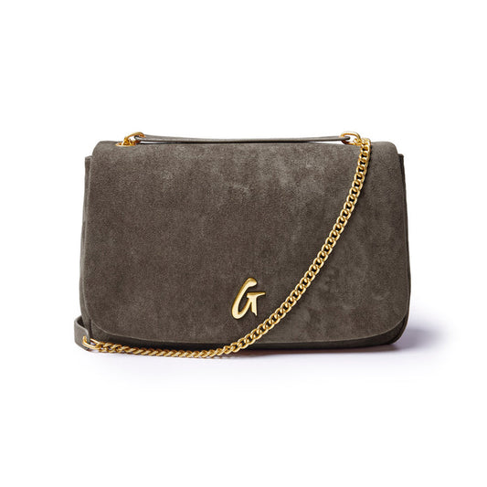 Medium olive green suede flap bag with a gold chain strap and logo detail, perfect for stylish everyday use.