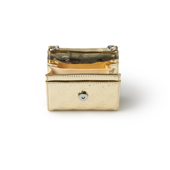 Metallic gold compact wallet with monogram pattern, multiple card slots, and a snap button closure.