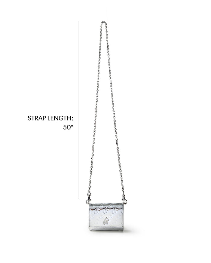 Metallic silver compact wallet on a chain with monogram design, featuring a 50-inch strap for versatile styling.