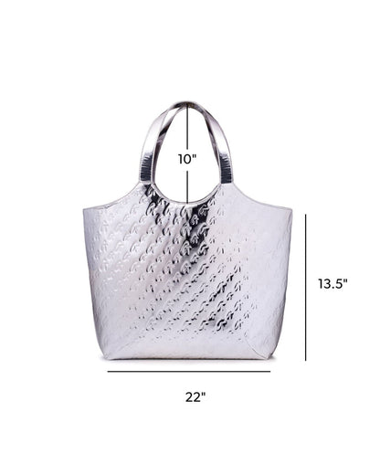 Metallic silver maxi tote with embossed monogram design, featuring sturdy handles and spacious interior.