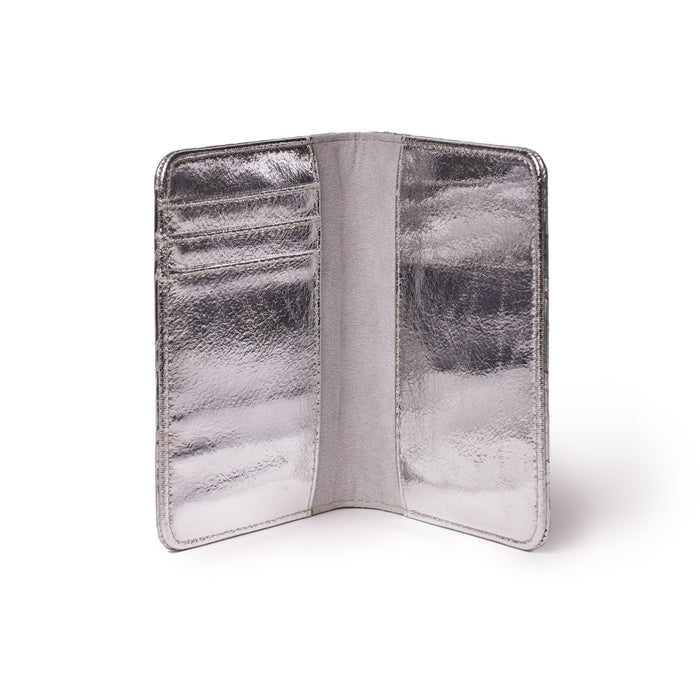Metallic silver passport holder with a monogram design, featuring multiple card slots and a sleek, shiny finish.