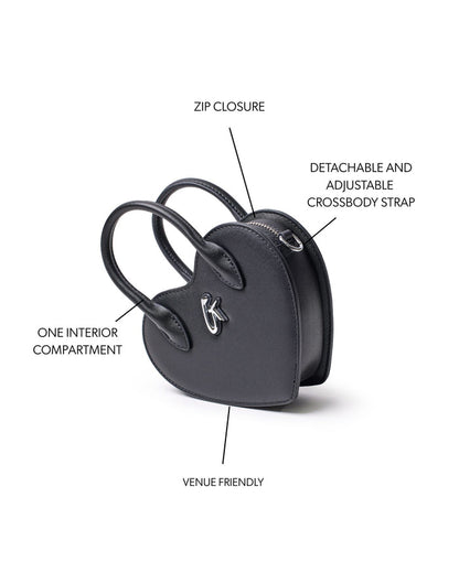 Mini heart-shaped black bag with zip closure, adjustable crossbody strap, and one interior compartment.