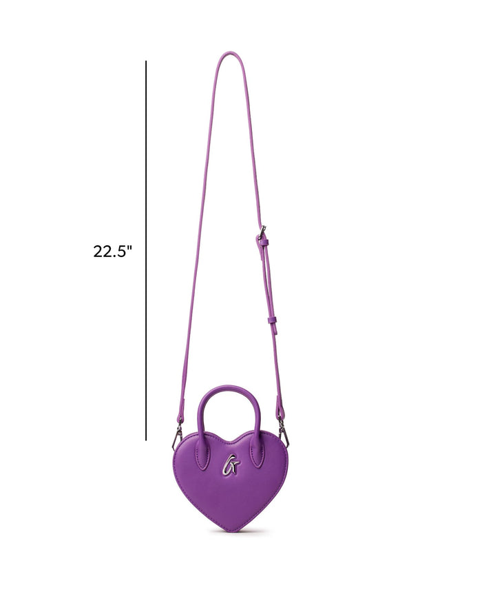 Mini heart-shaped handbag in vibrant purple with a stylish handle and adjustable strap, measuring 22.5 inches.