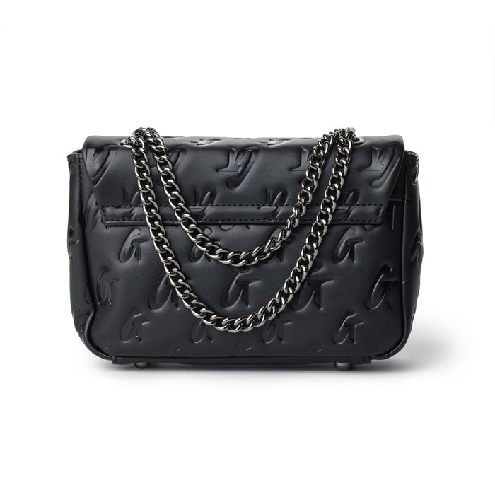 Black mini monogram flap bag with embossed logo pattern and silver chain strap.