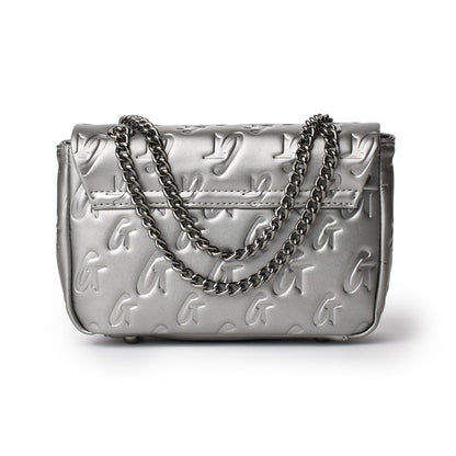 Mini Monogram Flap Bag in platinum with embossed logo pattern and a silver chain strap.