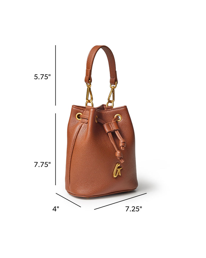 Brown mini pebble bucket bag with gold accents, featuring a drawstring closure and a stylish handle.