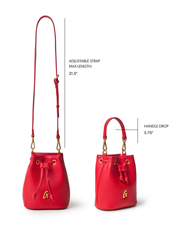Red mini pebble bucket bag with adjustable strap and gold accents, perfect for stylish, affordable luxury.