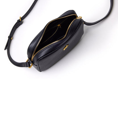 Black mini pebble camera bag with gold zipper and adjustable strap, open to reveal interior compartments.