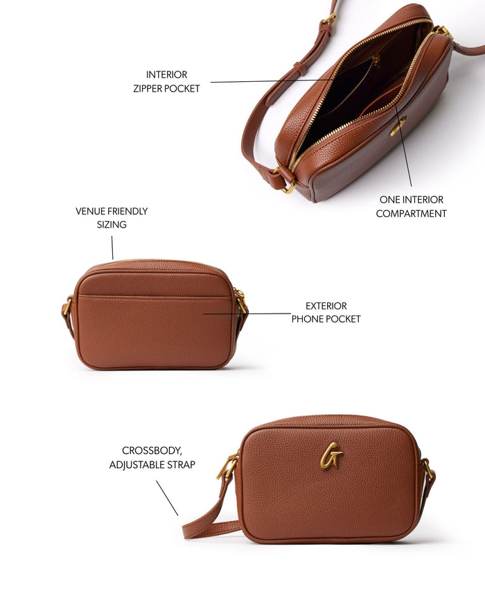 Brown mini pebble camera bag featuring an adjustable crossbody strap, exterior phone pocket, and interior zipper pocket.