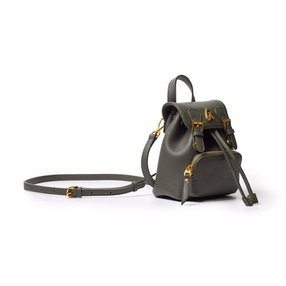 Olive green mini pebble crossbody backpack with gold hardware, adjustable strap, and front zip pocket on a white background.