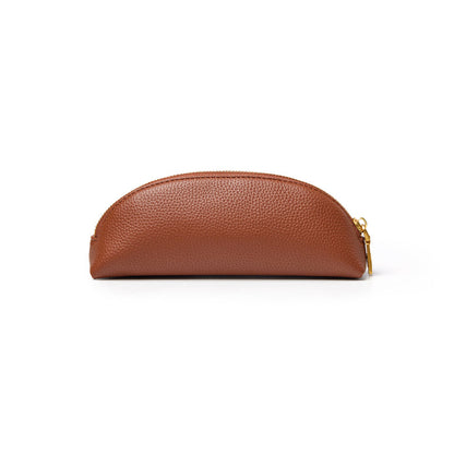 Brown pebble-textured pencil pouch with a rounded shape and gold zipper, perfect for stylish organization.