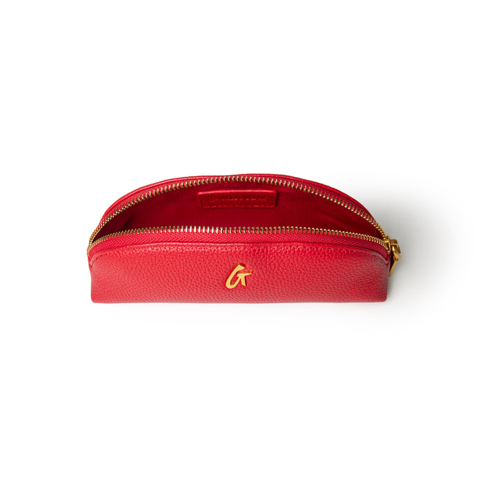 Red pebble pencil pouch with a gold zipper and embossed logo, perfect for organizing stationery and accessories.