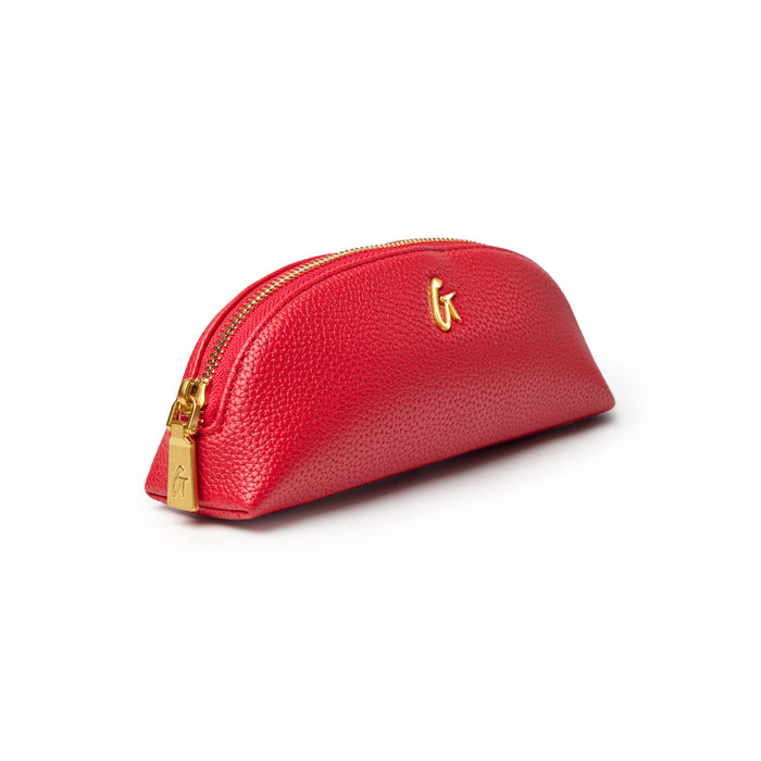 Red pebble-textured pencil pouch with a gold zipper, perfect for organizing stationery and accessories.