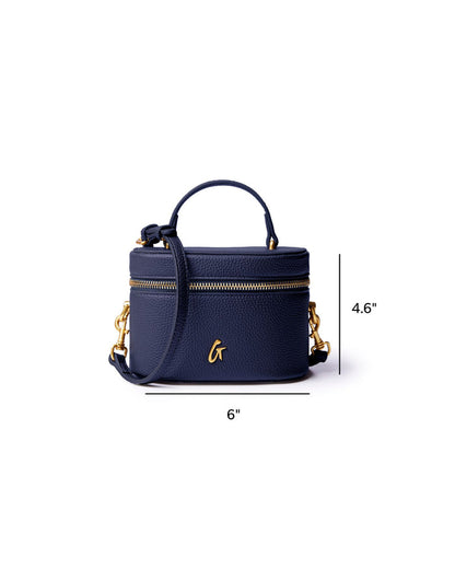 Navy mini pebble vanity bag with gold zippers and a detachable strap, perfect for stylish organization.
