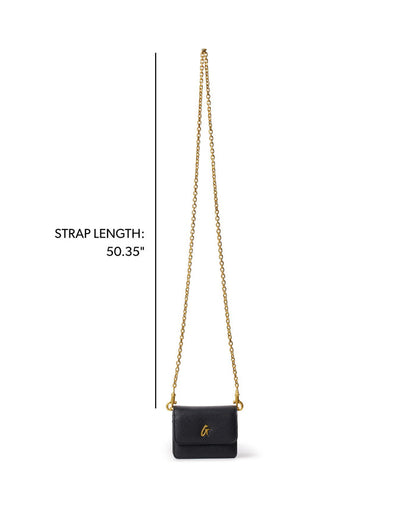 Mini Pebble WOC in black with a gold chain strap, featuring a sleek design perfect for stylish outings.