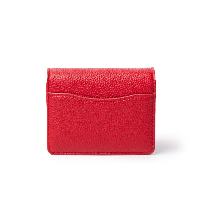 Red mini pebble leather wallet with a textured surface and front pocket, designed for women on the go.