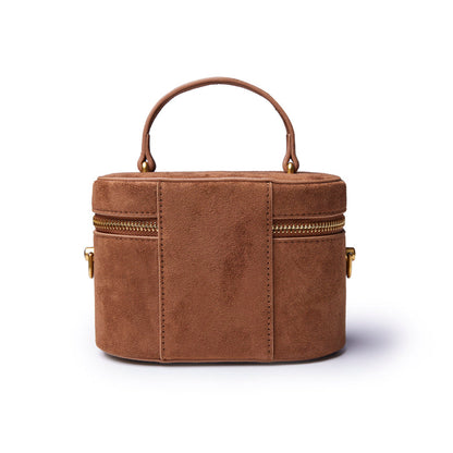 Brown mini suede vanity bag with a top handle and gold zipper accents, perfect for stylish organization.
