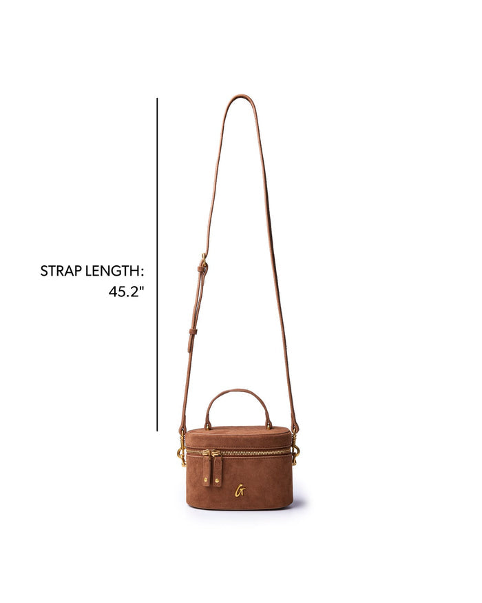 Mini suede vanity bag in brown with a detachable strap measuring 45.2 inches for versatile styling.