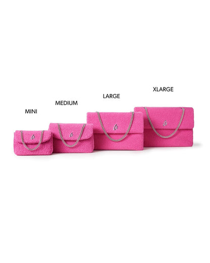 Mini Teddy Flap Bag in hot pink, showcasing its plush texture and stylish chain strap, perfect for chic, affordable luxury.