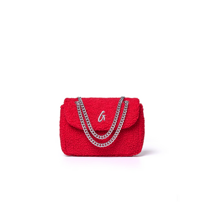 Mini Teddy flap bag in vibrant red with a textured finish and silver chain strap, perfect for stylish outings.