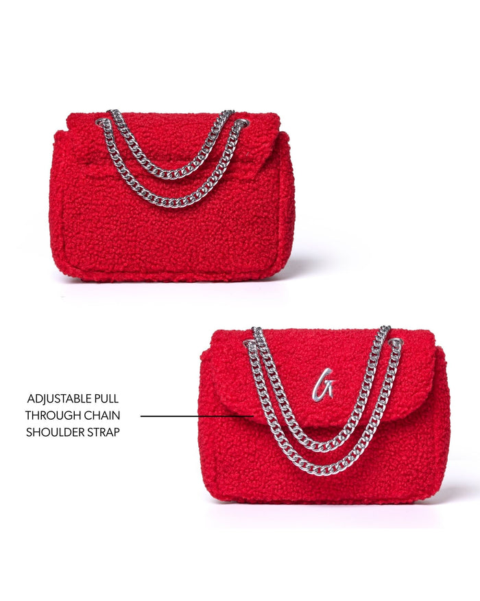 Mini Teddy Flap Bag in red with adjustable chain shoulder strap, featuring a textured fabric design.