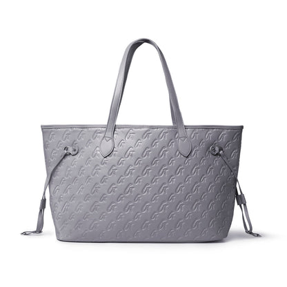 Gray monogram tote bag with stylish embossed logo, featuring dual handles and a spacious interior for everyday use.