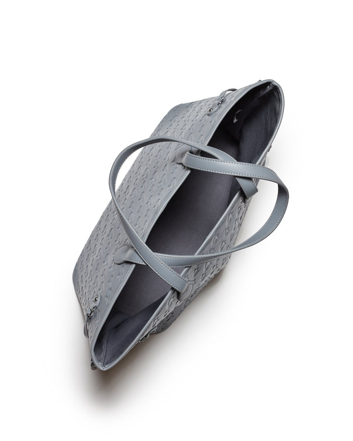 Gray Monogram Glam Tote with textured exterior, dual handles, and spacious interior, perfect for stylish everyday use.