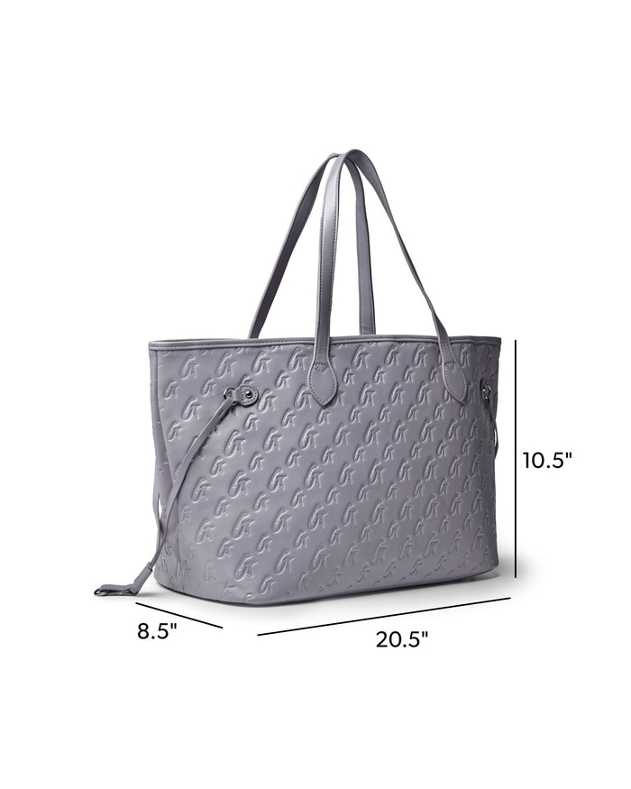 Gray monogram tote bag with stylish embossed design, featuring dual handles and spacious interior for everyday use.