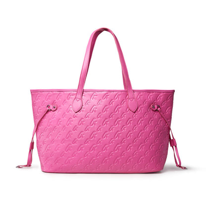 Hot pink monogram tote bag with dual handles and stylish embossed logo design, perfect for chic everyday use.
