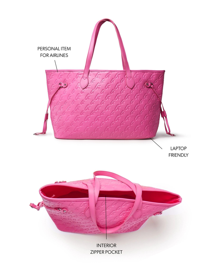 Hot pink monogram tote bag with laptop-friendly design and interior zipper pocket, ideal for stylish travel.