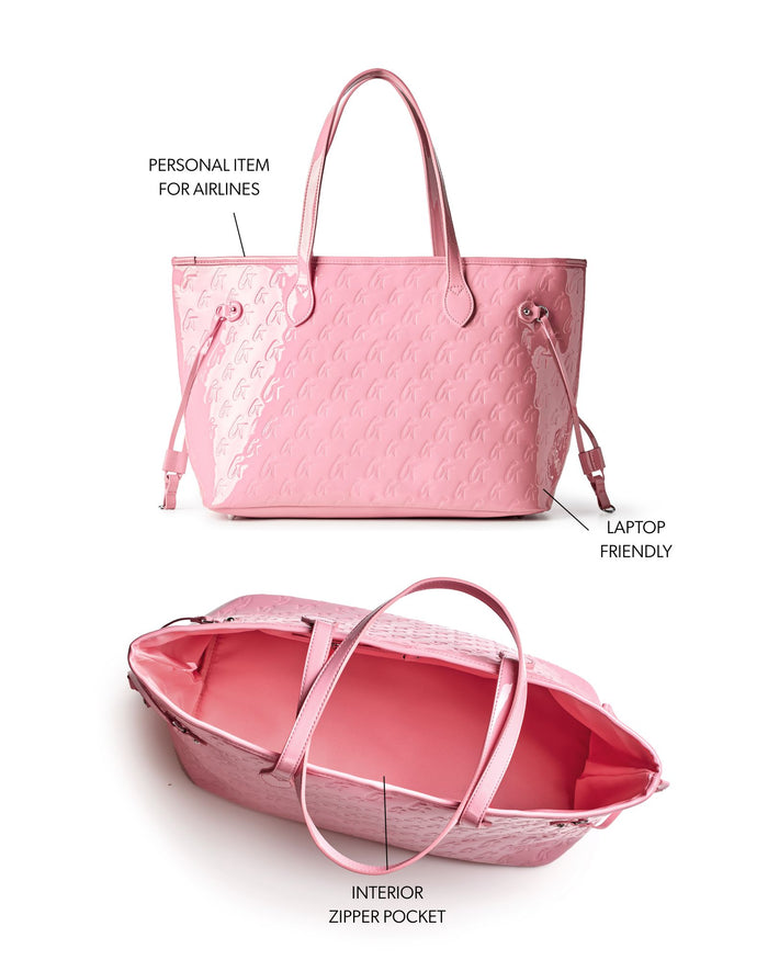 Stylish mirror pink monogram tote bag with interior zipper pocket, perfect for laptops and airline travel.