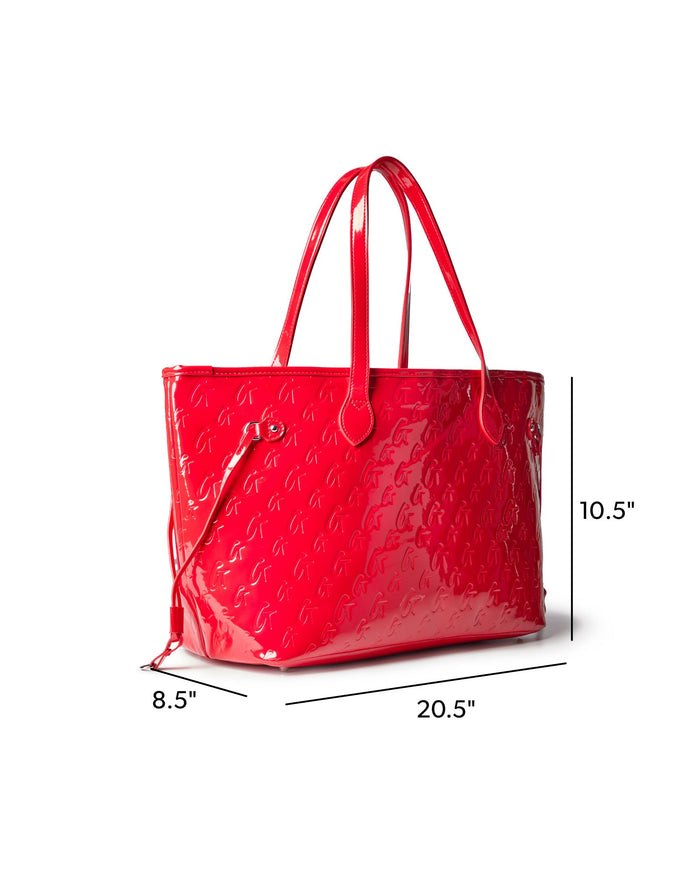Glossy red monogram tote bag with dual handles, measuring 20.5 inches wide and 10.5 inches tall, perfect for stylish outings.