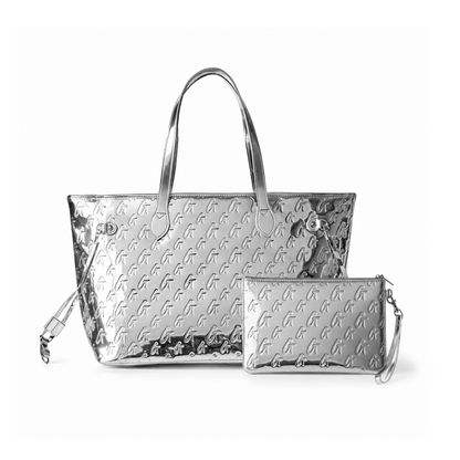 Metallic silver monogram glam tote with matching wristlet, perfect for stylish and affordable luxury.
