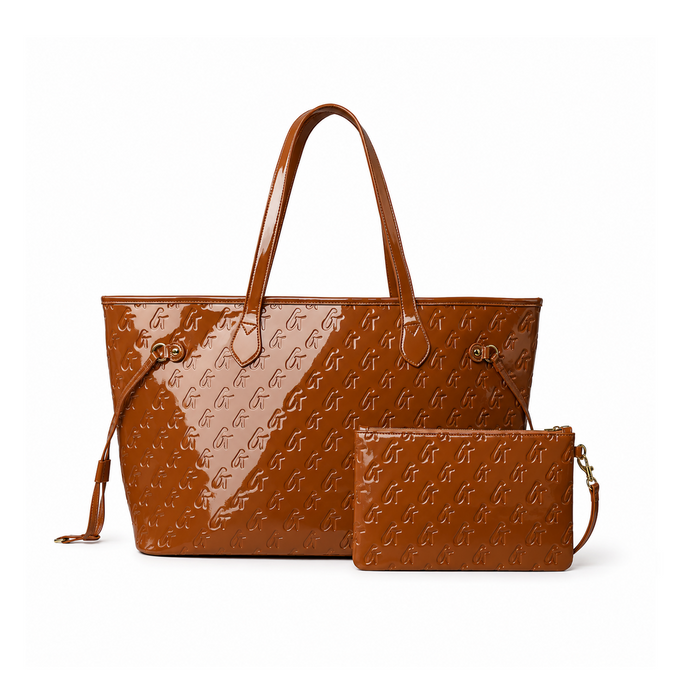 Monogram Glam Tote in mirror brown with matching wristlet, featuring a sleek design and stylish embossed logo.