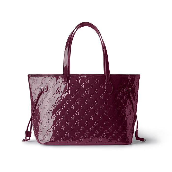 Mirror burgundy monogram glam tote with wristlet, featuring a sleek design and spacious interior for stylish organization.