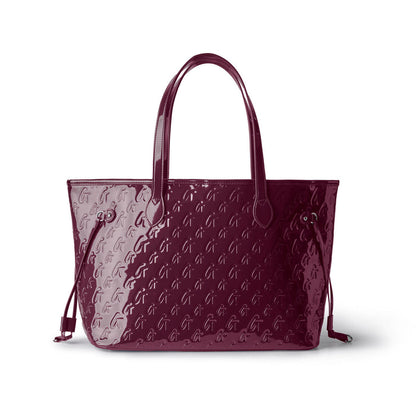 Mirror burgundy monogram glam tote with wristlet, featuring a sleek design and spacious interior for stylish organization.