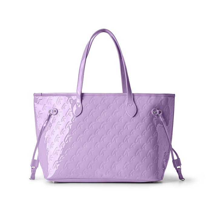 Lavender monogram tote bag with wristlet, featuring a sleek design and adjustable drawstring details.
