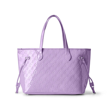 Lavender monogram tote bag with wristlet, featuring a sleek design and adjustable drawstring details.
