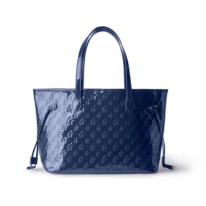 Navy monogram tote bag with glossy finish and matching wristlet, perfect for stylish everyday use.