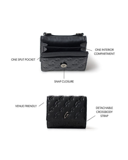 Black monogram gunmetal compact wallet on chain with snap closure, interior compartment, and detachable crossbody strap.