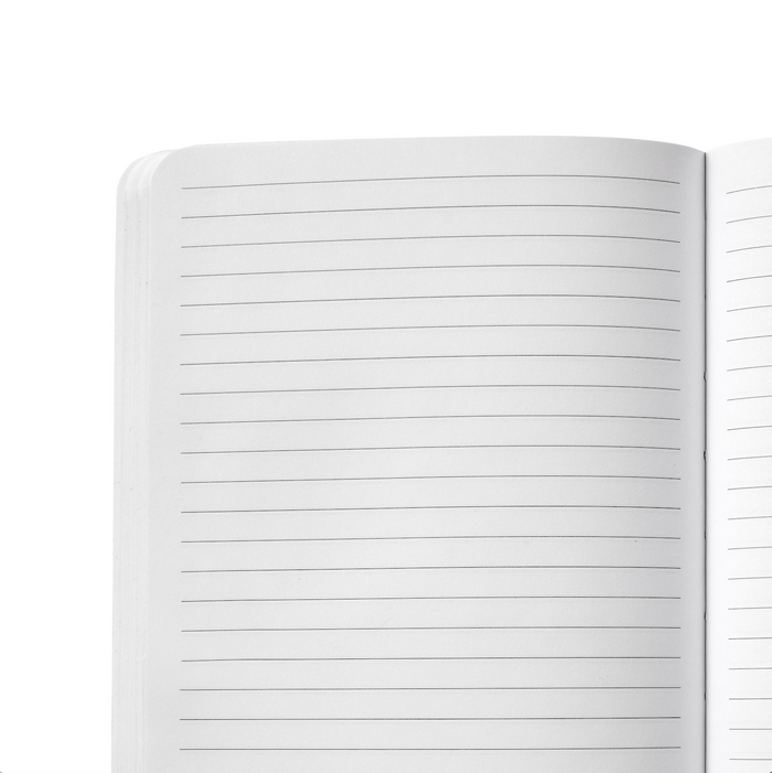 Open gray monogram notebook with lined pages, blank and ready for writing or note-taking.