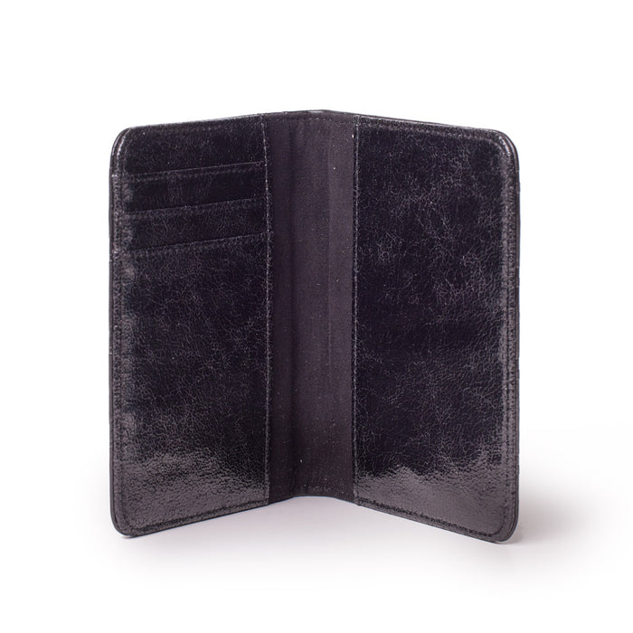 Black monogram passport holder with multiple card slots, open to show interior compartments.