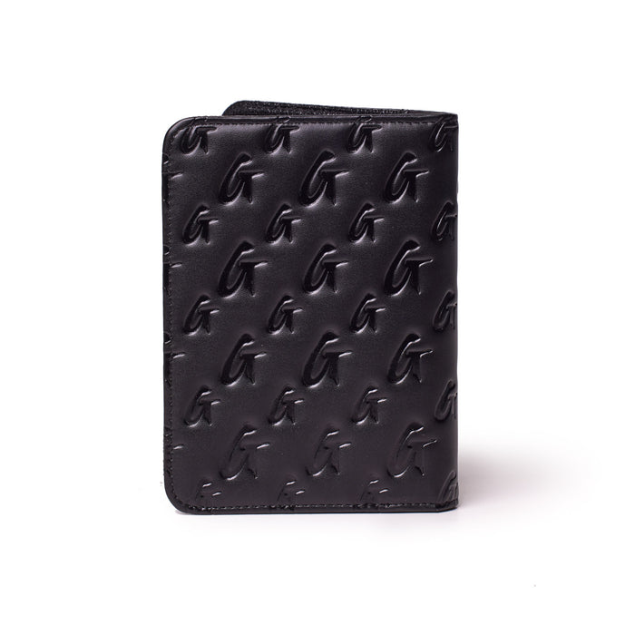 Black monogram passport holder with embossed G pattern, compact design for travel accessories.