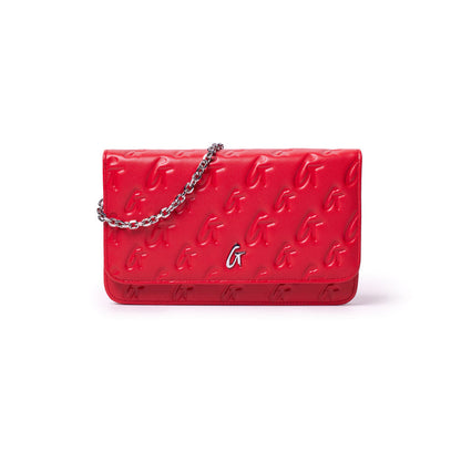 Red Monogram Silver WOC clutch with embossed "G" pattern and a silver chain strap.