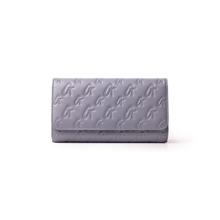 Gray Monogram Travel Wallet with embossed G pattern, sleek design, and fold-over flap for secure travel organization.