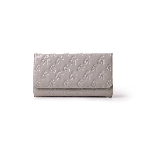Mirror gray Monogram Travel Wallet with embossed G logo pattern, sleek design, and fold-over flap.