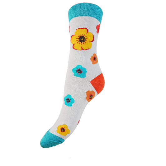 A pair of grey socks with multicolored floral patterns and blue at the heel, cuff, and toe.