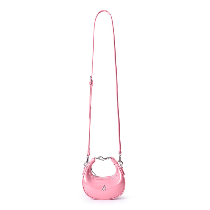Light pink hobo bag with a sleek mirror finish and adjustable strap, perfect for adding a touch of luxury to any outfit.